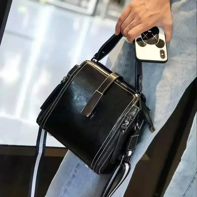 Elegante borsa a tracolla in vera pelle