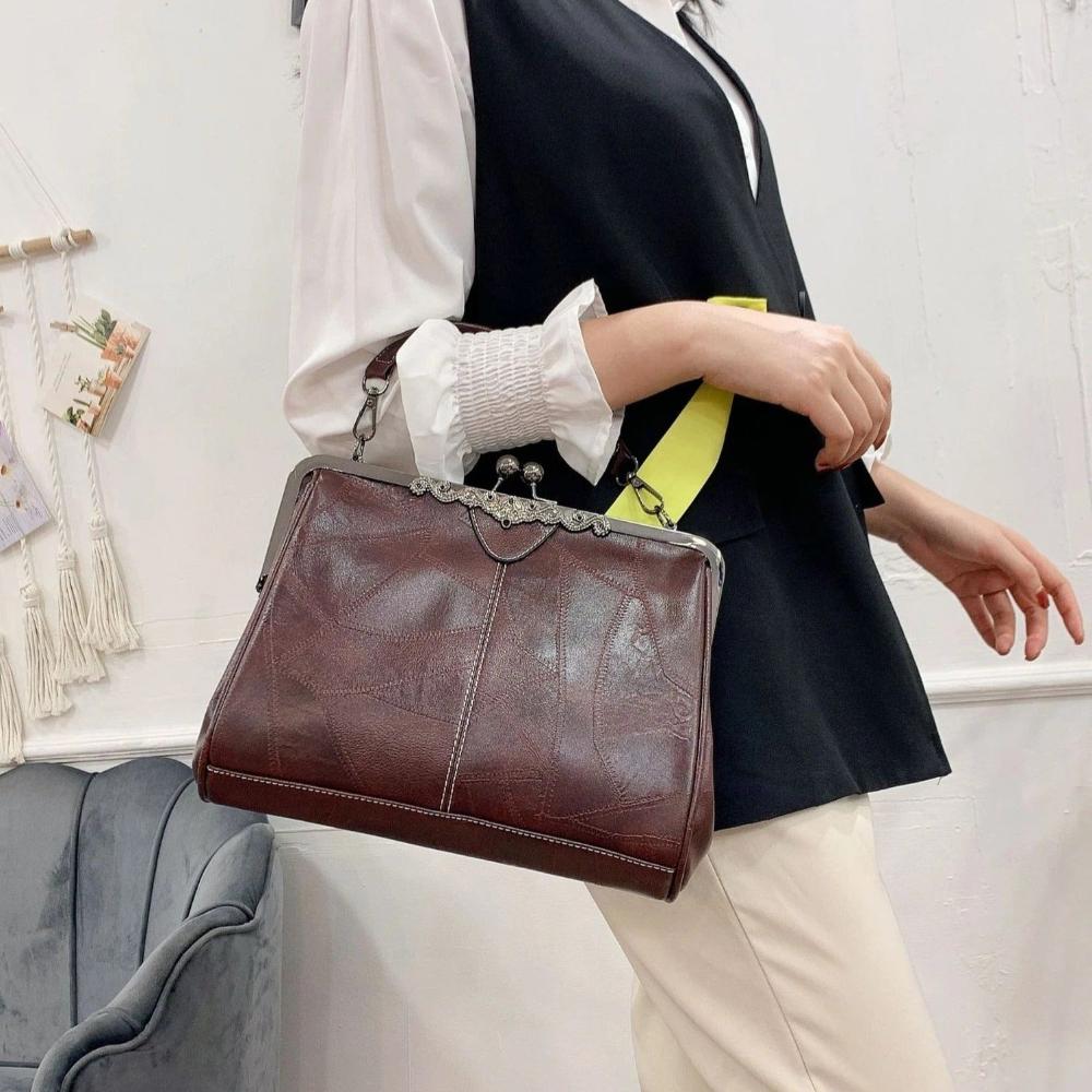 Borsa vintage con chiusura a bacio