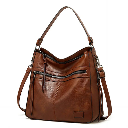 Ciondolo vintage di Muriel | Borsa a tracolla in pelle